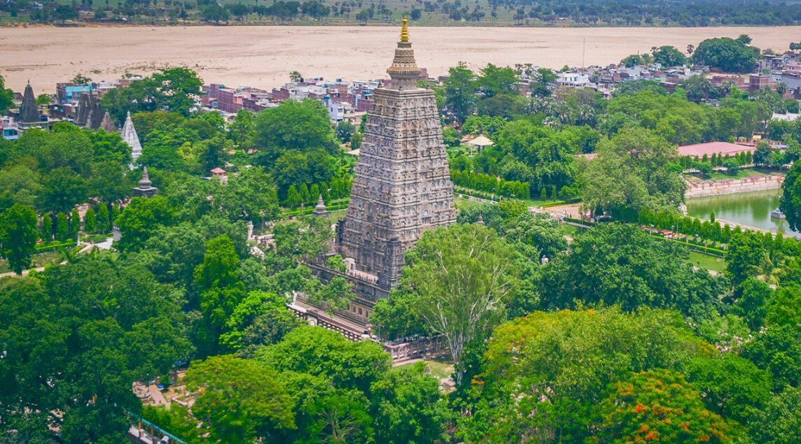An aerial view of the Mahabodhi Temple complex amid greenery in Bodh Gaya, Bihar