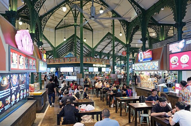 Hawker stalls and diners beneath Lau Pa Sat’s historic roof