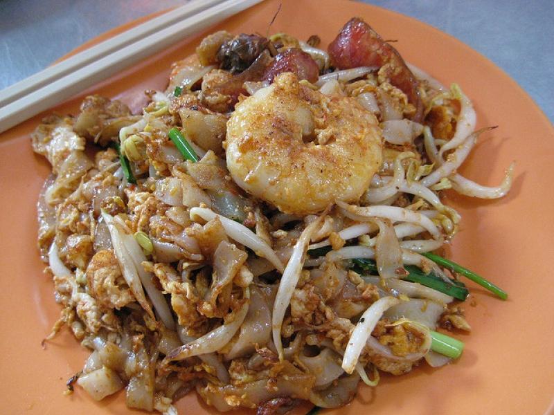 Singapore char kway teow with flat rice noodles, egg and bean sprouts